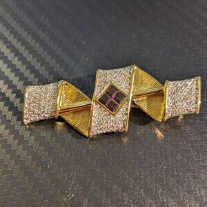 Swarovski Elegant Gold and Silver Brooch with Purple Accent